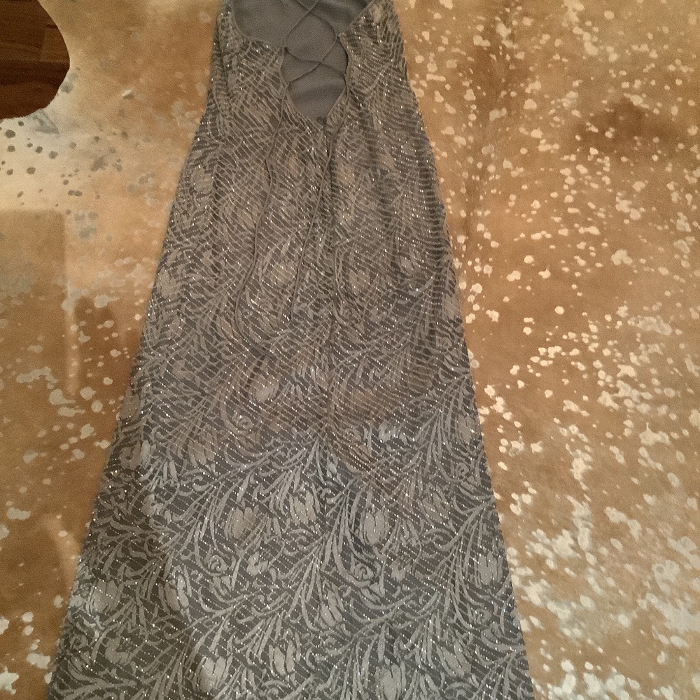 Maxi bugle bead special occasion dress w/criss cross open low back. Kay Unger